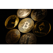 如果美联储再次降息，比特币、以太坊和狗狗币价格会如何变化